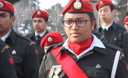A group of young army cadets marching