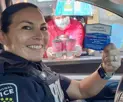 officer supporting community charity at Tims