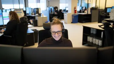 Police communicator smiling