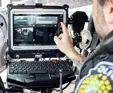 Police officer on laptop