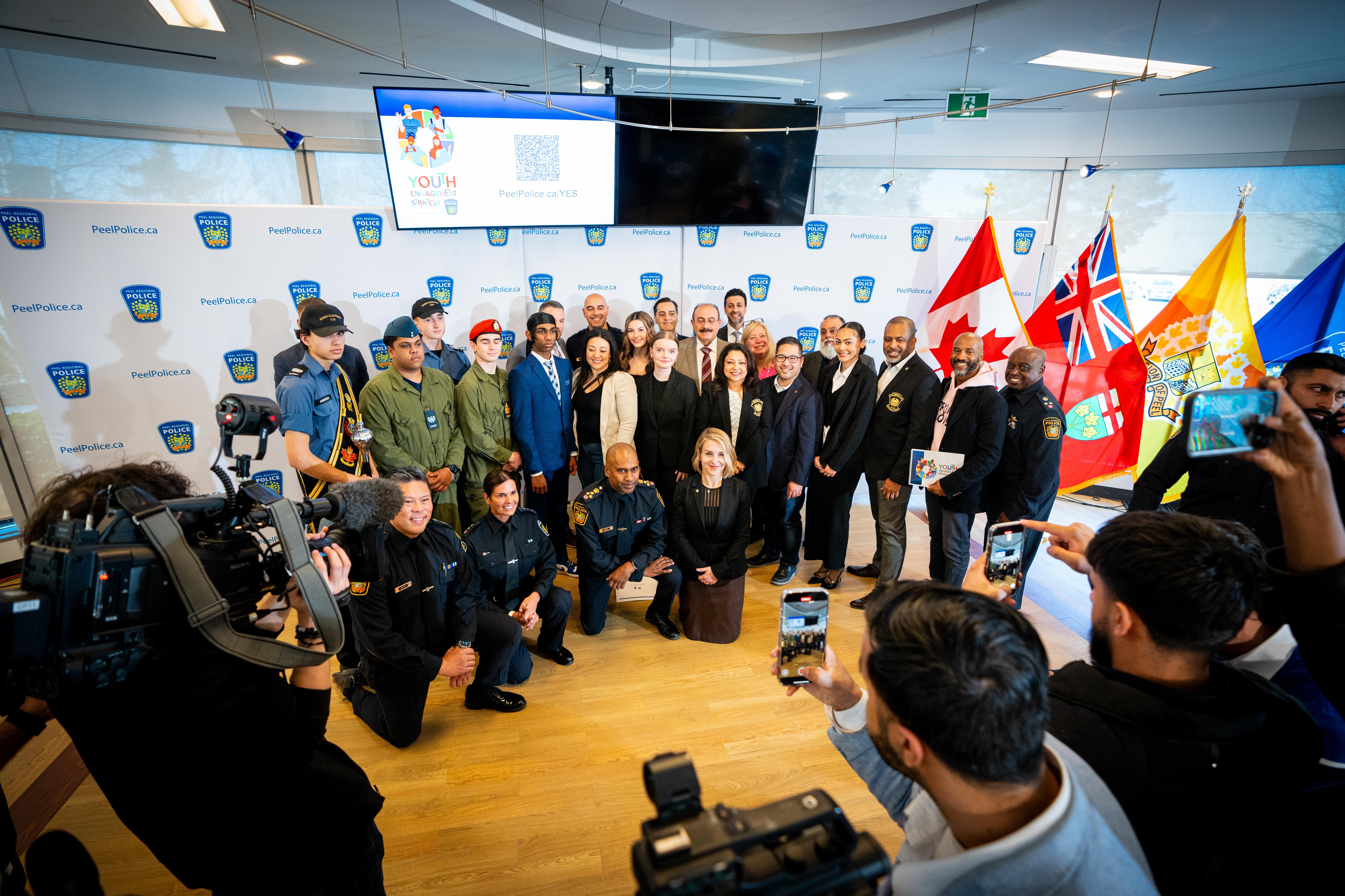 Youth with Peel Police leaders at press conference