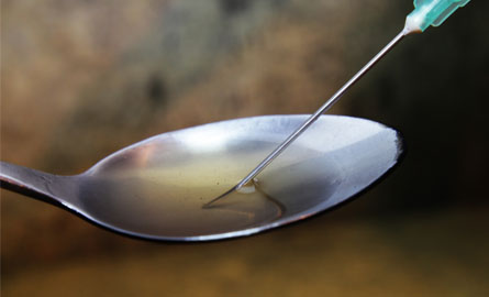 Drug being placed into a needle