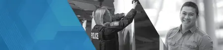 female officer setting up shooting target and smiling service tech 