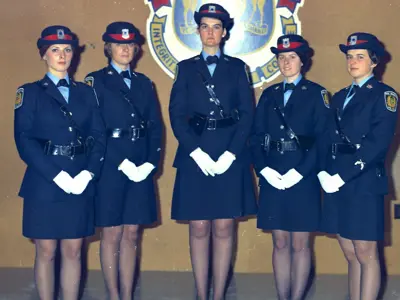 Female officers on International Day for the Elimination of Violence Against Women in the 1970s.